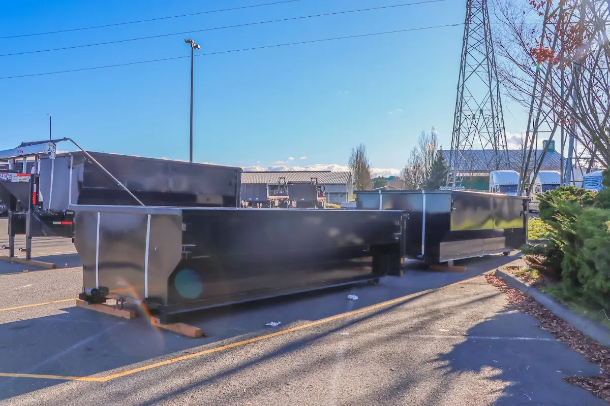 Roll-off dumpster ready for waste disposal at job site for 30 Yard Dumpster Rental in Sidney